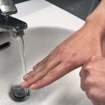 An image of thumb washing