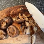 An image of soaked dried shiitake mushrooms