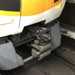 An image of a train coupling to illustrate the "and" in Japanese 